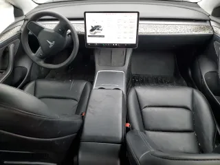 2021 Tesla Model 3 Standard Range Plus with VIN 5YJ3E1EA5MF028051, listed as a Copart auction lot 48085105 with 49,531 mi miles and Clean Title. Bid and sale history available at carsss.com. Image 8.