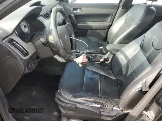 2009 Ford Focus SES with VIN 1FAHP36NX9W254950, listed as a Copart auction lot 70338674 with 197,107 mi miles and Salvage Title. Bid and sale history available at carsss.com. Image 7.