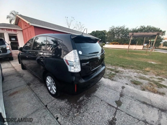 2012 Toyota Prius v Two with VIN JTDZN3EU0C3129896, listed as a Copart auction lot 52939915 with 105,042 mi miles and Salvage Title. Bid and sale history available at carsss.com. Image 3.