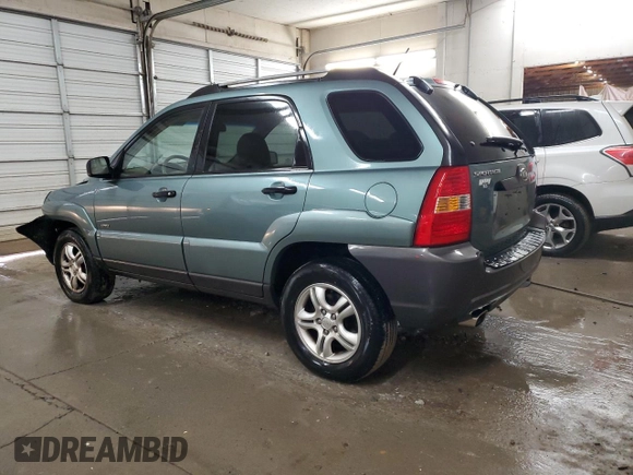 2005 Kia Sportage LX with VIN KNDJE723657083048, listed as a Copart auction lot 85794364 with 172,420 mi miles and Salvage Title. Bid and sale history available at carsss.com. Image 2.