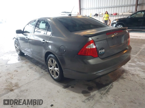 2012 Ford Fusion SE z VIN 3FAHP0HA9CR325249, wystawiony jako IAAI lot #41803339 z przebiegiem 203 650 mil mil oraz . Historia ofert i sprzedaży dostępna na DreamBid. Obrazek 3.