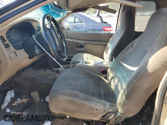 2000 Ford Explorer Sport with VIN 1FMYU60E3YUA95157, listed as a Copart auction lot 77214804 with 322,604 mi miles and Salvage title. Bid and sale history available at DreamBid. Image 7.
