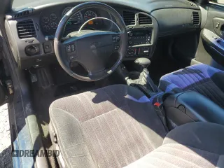 2000 Chevrolet Monte Carlo SS z VIN 2G1WX12K2Y9300241, wystawiony jako Copart lot #55601585 z przebiegiem 189 881 mil mil oraz Szkoda całkowita • Salvage title. Historia ofert i sprzedaży dostępna na DreamBid. Obrazek 8.