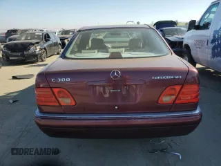 1998 Mercedes-Benz E 320 with VIN WDBJF25FXWA549962, listed as a Copart auction lot 87876005 with 303,884 mi miles and Salvage Title. Bid and sale history available at DreamBid. Image 6.