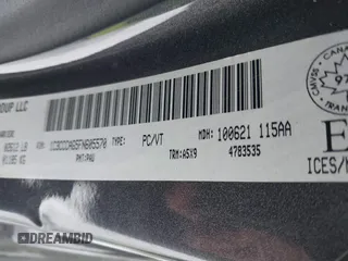 2015 Chrysler 200 Limited with VIN 1C3CCCAG5FN605570, listed as a IAAI auction lot 41246742 with 142,574 mi miles. Bid and sale history available at carsss.com. Image 9.