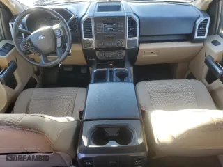 2015 Ford F-150 XLT w/HD Payload Pkg with VIN 1FTFW1EG1FKD03354, listed as a Copart auction lot 87190684 with 185,579 mi miles and Salvage Title. Bid and sale history available at carsss.com. Image 8.