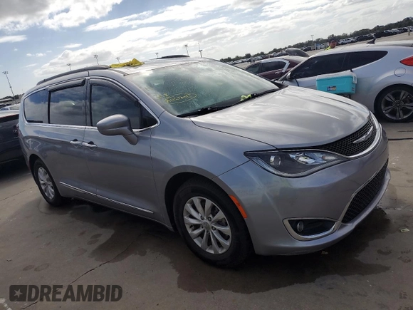 2017 Chrysler Pacifica Touring L with VIN 2C4RC1BG2HR552731, listed as a Copart auction lot 75826124 with Not Provided miles and Salvage Title. Bid and sale history available at DreamBid. Image 4.