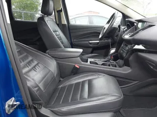 2018 Ford Escape Titanium with VIN 1FMCU0J97JUD34272, listed as a IAAI auction lot 42078237 with 87,783 mi miles and . Bid and sale history available at DreamBid. Image 5.