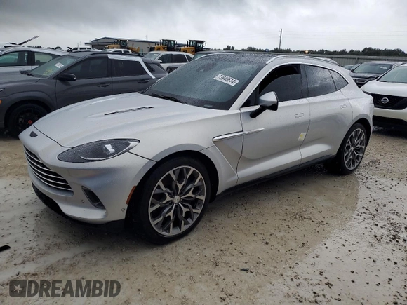 2021 Aston Martin DBX z VIN SCFVUJAW4MTV03930, wystawiony jako Copart lot #73946614 z przebiegiem Nie podano mil oraz Nie do naprawy. Historia ofert i sprzedaży dostępna na DreamBid. Obrazek 1.