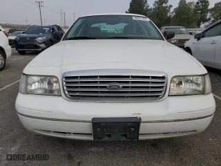 2005 Ford Crown Victoria LX with VIN 2FAFP74W95X124697, listed as a Copart auction lot 86931404 with 303,132 mi miles and Clean Title. Bid and sale history available at carsss.com. Image 5.