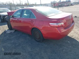 2007 Toyota Camry CE with VIN 4T1BE46K77U183843, listed as a IAAI auction lot 41674245 with 140,949 mi miles. Bid and sale history available at carsss.com. Image 3.