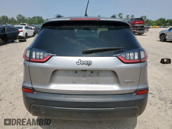 2019 Jeep Cherokee Latitude with VIN 1C4PJLCB2KD332429, listed as a Copart auction lot 58076815 with 124,958 mi miles and Salvage title. Bid and sale history available at DreamBid. Image 6.