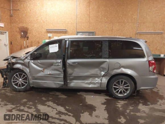 2015 Dodge Grand Caravan SE with VIN 2C4RDGBG1FR738659, listed as a IAAI auction lot 41547350 with 96,621 mi miles and . Bid and sale history available at DreamBid. Image 14.