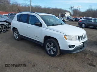 2012 Jeep Compass Latitude with VIN 1C4NJDEB5CD584509, listed as a IAAI auction lot 41672784 with 166,271 mi miles. Bid and sale history available at carsss.com. Image 1.
