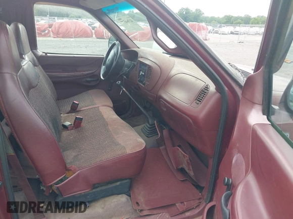 1997 Ford F-150 with VIN 1FTDF1720VNB30982, listed as a IAAI auction lot 42764577 with 296,424 mi miles and . Bid and sale history available at DreamBid. Image 5.