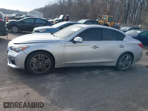 2015 Infiniti Q50 Premium z VIN JN1BV7AR8FM417712, wystawiony jako IAAI lot #41427839 z przebiegiem 88 424 mil mil oraz . Historia ofert i sprzedaży dostępna na DreamBid. Obrazek 13.