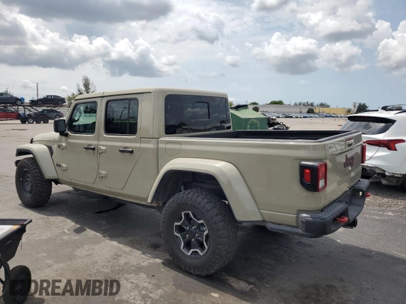 2022 Jeep Gladiator Rubicon с VIN 1C6JJTBG2NL171598, выставлен на аукционе Copart как лот 59494925 с пробегом 46 097 миль миль и Списание • Salvage title. История ставок и продаж доступна на DreamBid. Изображение 2.