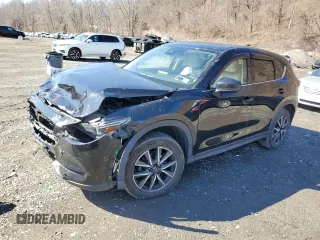 2017 Mazda CX-5 Grand Touring with VIN JM3KFBDL6H0211374, listed as a Copart auction lot 49079775 with 142,164 mi miles and Salvage Title. Bid and sale history available at carsss.com. Image 1.