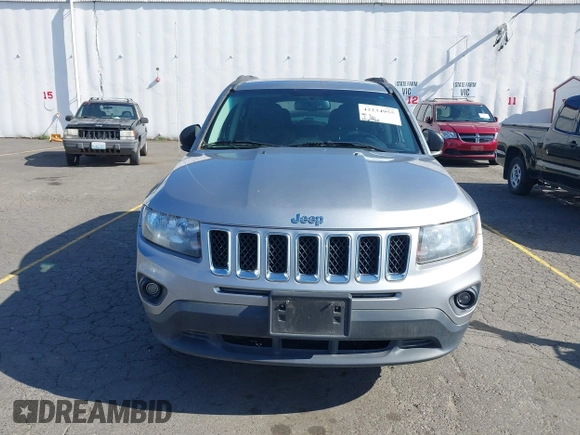 2016 Jeep Compass Sport with VIN 1C4NJCBA5GD574185, listed as a IAAI auction lot 42234955 with 127,468 mi miles and . Bid and sale history available at DreamBid. Image 6.