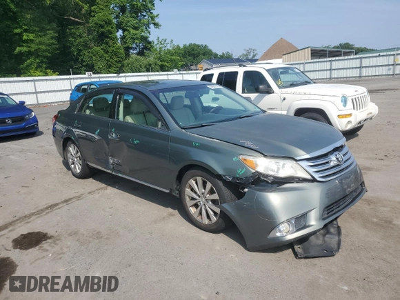2011 Toyota Avalon with VIN 4T1BK3DB2BU391241, listed as a Copart auction lot 60507195 with 132,229 mi miles and Salvage title. Bid and sale history available at DreamBid. Image 4.