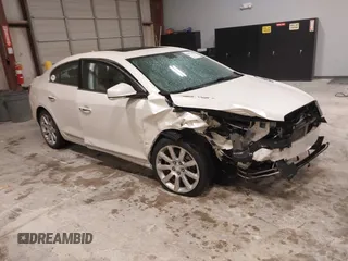 2012 Buick LaCrosse Touring with VIN 1G4GJ5E39CF248658, listed as a IAAI auction lot 41901688 with 151,761 mi miles and . Bid and sale history available at DreamBid. Image 1.