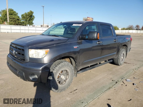 2012 Toyota Tundra 4WD Truck with VIN 5TFDW5F10CX233367, listed as a Copart auction lot 77144064 with 199,361 mi miles and Salvage Title. Bid and sale history available at carsss.com. Image 1.