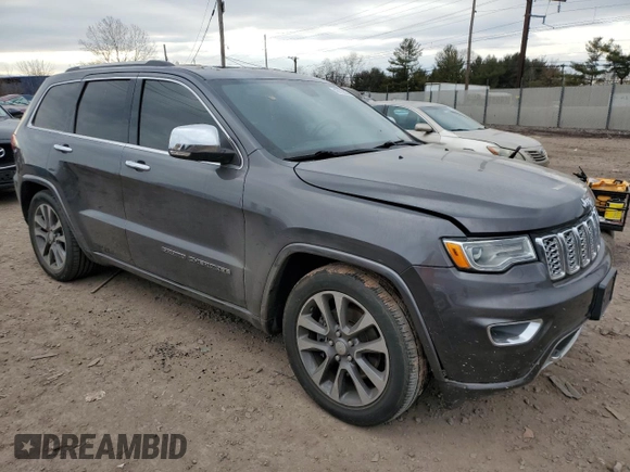 2017 Jeep Grand Cherokee Overland with VIN 1C4RJFCT5HC874593, listed as a Copart auction lot 46770205 with 72,744 mi miles and Salvage Title. Bid and sale history available at carsss.com. Image 4.