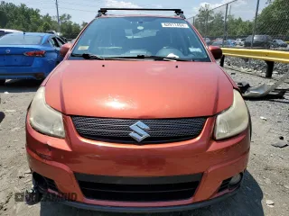 2009 Suzuki SX4 Touring AWD with VIN JS2YB417696200378, listed as a Copart auction lot 62911494 with 176,257 mi miles and Salvage Title. Bid and sale history available at DreamBid. Image 5.