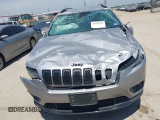 2021 Jeep Cherokee Altitude z VIN 1C4PJLLB4MD215146, wystawiony jako IAAI lot #42253929 z przebiegiem 42 666 mil mil oraz . Historia ofert i sprzedaży dostępna na DreamBid. Obrazek 12.