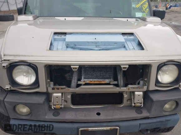 2003 Hummer H2 with VIN 5GRGN23U73H142389, listed as a IAAI auction lot 42219627 with 78,547 mi miles. Bid and sale history available at carsss.com. Image 6.