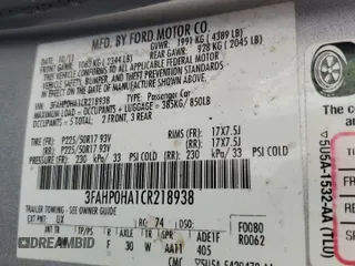 2012 Ford Fusion SE z VIN 3FAHP0HA1CR218938, wystawiony jako Copart lot #59588135 z przebiegiem 111 243 mil mil oraz Szkoda całkowita • Salvage title. Historia ofert i sprzedaży dostępna na DreamBid. Obrazek 12.