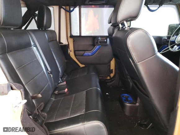 2012 Jeep Wrangler Unlimited Sahara with VIN 1C4BJWEG5CL281584, listed as a Copart auction lot 50982655 with 132,548 mi miles and Salvage Title. Bid and sale history available at carsss.com. Image 11.