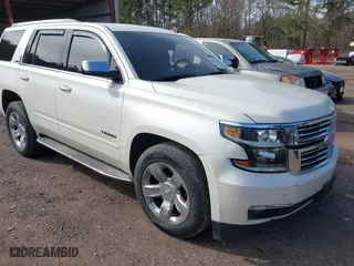 2015 Chevrolet Tahoe LTZ with VIN 1GNSCCKC2FR140524, listed as a IAAI auction lot 41592878 with 284,785 mi miles. Bid and sale history available at carsss.com. Image 1.