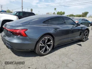 2023 Audi e-tron GT Premium Plus z VIN WAUCJBFWXP7008476, wystawiony jako Copart lot #51587884 z przebiegiem 2421 mil mil oraz . Historia ofert i sprzedaży dostępna na DreamBid. Obrazek 3.