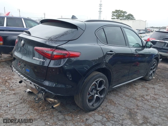 2023 Alfa Romeo Stelvio Ti with VIN ZASPAKBN6P7D56722, listed as a IAAI auction lot 41363962 with 50,073 mi miles. Bid and sale history available at carsss.com. Image 4.