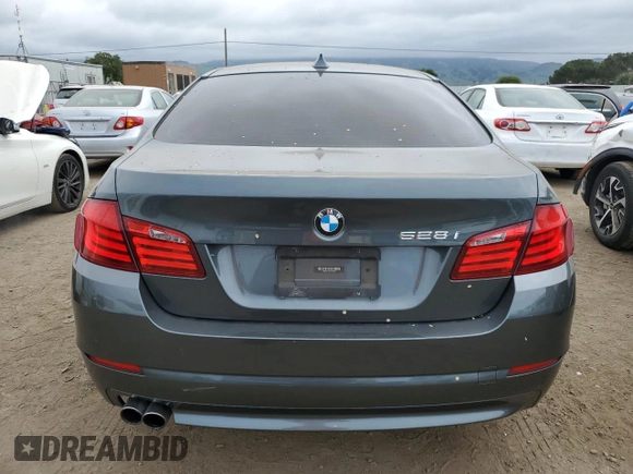 2011 BMW 5 Series 528i with VIN WBAFR1C55BC750294, listed as a Copart auction lot 52943035 with 137,909 mi miles and Salvage Title. Bid and sale history available at carsss.com. Image 6.
