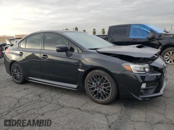 2015 Subaru WRX STI with VIN JF1VA2P63F9837070, listed as a Copart auction lot 82681544 with 106,503 mi miles and Clean Title. Bid and sale history available at DreamBid. Image 4.