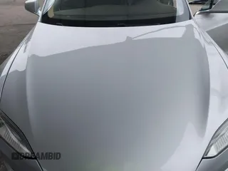 2014 Tesla Model S 60 with VIN 5YJSA1H12EFP32213, listed as a IAAI auction lot 42194085 with 56,071 mi miles and . Bid and sale history available at DreamBid. Image 10.