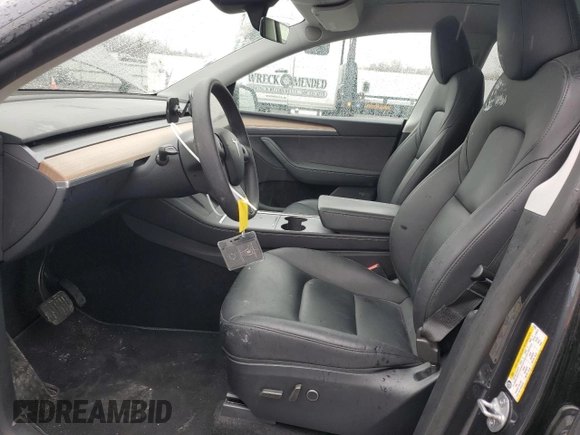 2024 Tesla Model Y Long Range with VIN 7SAYGDEE6RA278636, listed as a Copart auction lot 48718085 with 21,349 mi miles and Salvage Title. Bid and sale history available at DreamBid. Image 7.