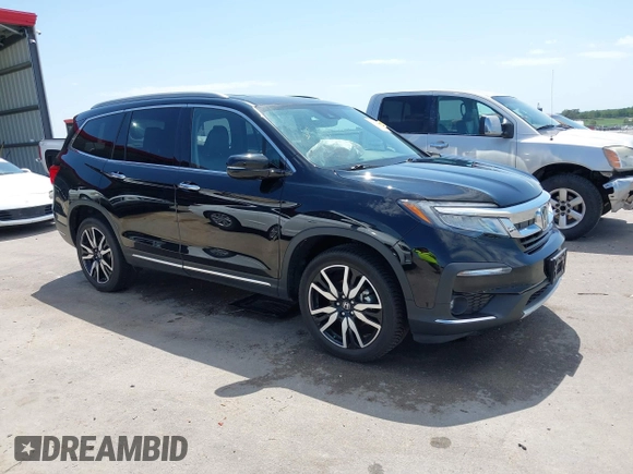 2019 Honda Pilot Touring 7-Passenger with VIN 5FNYF6H67KB031988, listed as a IAAI auction lot 42519588 with 41,368 mi miles and . Bid and sale history available at DreamBid. Image 1.