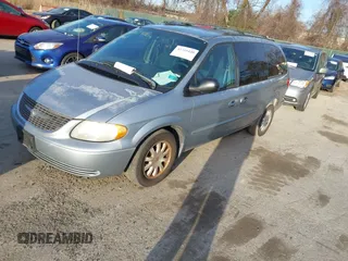 2003 Chrysler Town & Country LX with VIN 2C4GP44L73R238380, listed as a IAAI auction lot 41705420 with 129,225 mi miles and . Bid and sale history available at DreamBid. Image 2.