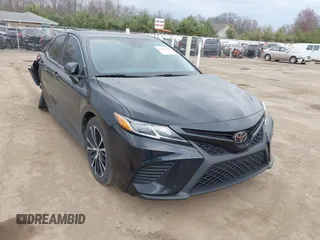 2018 Toyota Camry LE z VIN JTNB11HK6J3005121, wystawiony jako IAAI lot #42065784 z przebiegiem 114 907 mil mil oraz . Historia ofert i sprzedaży dostępna na DreamBid. Obrazek 1.