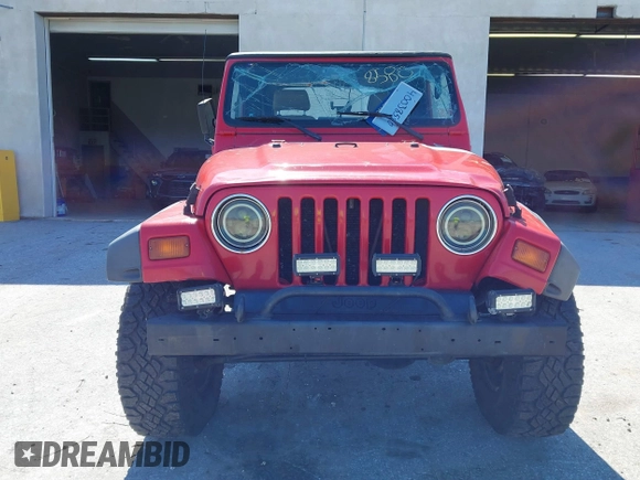 1999 Jeep Wrangler Sport with VIN 1J4FY19S0XP468304, listed as a IAAI auction lot 40038580 with 123,247 mi miles. Bid and sale history available at carsss.com. Image 12.