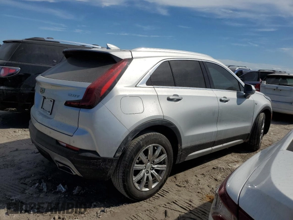 2019 Cadillac XT4 FWD Premium Luxury z VIN 1GYFZCR42KF147440, wystawiony jako Copart lot #45549835 z przebiegiem Nie podano mil oraz Szkody całkowita. Historia ofert i sprzedaży dostępna na DreamBid. Obrazek 3.