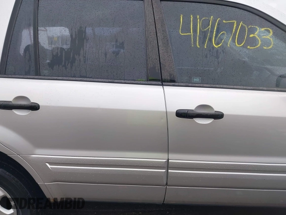 2007 Honda Pilot LX with VIN 2HKYF18157H530370, listed as a IAAI auction lot 41967033 with 214,590 mi miles and . Bid and sale history available at DreamBid. Image 13.