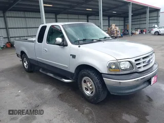 1999 Ford F-150 with VIN 1FTRX17W5XNC01330, listed as a IAAI auction lot 42101633 with 262,374 mi miles and . Bid and sale history available at DreamBid. Image 1.