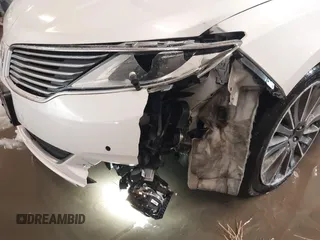 2014 Lincoln MKZ with VIN 3LN6L2J92ER836146, listed as a IAAI auction lot 41583343 with 130,613 mi miles. Bid and sale history available at carsss.com. Image 6.