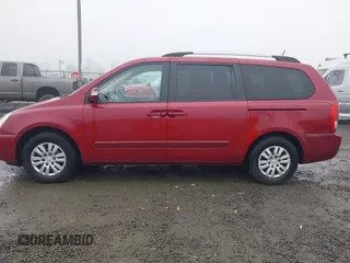 2011 Kia Sedona LX with VIN KNDMG4C71B6411453, listed as a IAAI auction lot 41316825 with 261,028 mi miles. Bid and sale history available at carsss.com. Image 15.