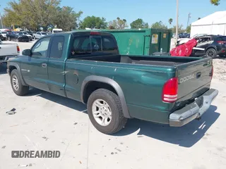 2002 Dodge Dakota with VIN 1B7GL12X32S619222, listed as a IAAI auction lot 41793106 with 97,649 mi miles and . Bid and sale history available at carsss.com. Image 3.
