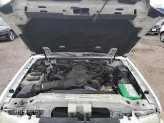 2002 Ford Explorer Sport XLS z VIN 1FMZU70E72UC68289, wystawiony jako Copart lot #79013744 z przebiegiem 149 269 mil mil oraz Szkoda całkowita • Salvage title. Historia ofert i sprzedaży dostępna na DreamBid. Obrazek 12.